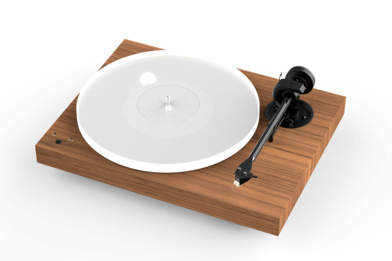 The Pro-Ject X1 B turntable comes in a real walnut wood veneer as well as hand-done high gloss white or black paint.
