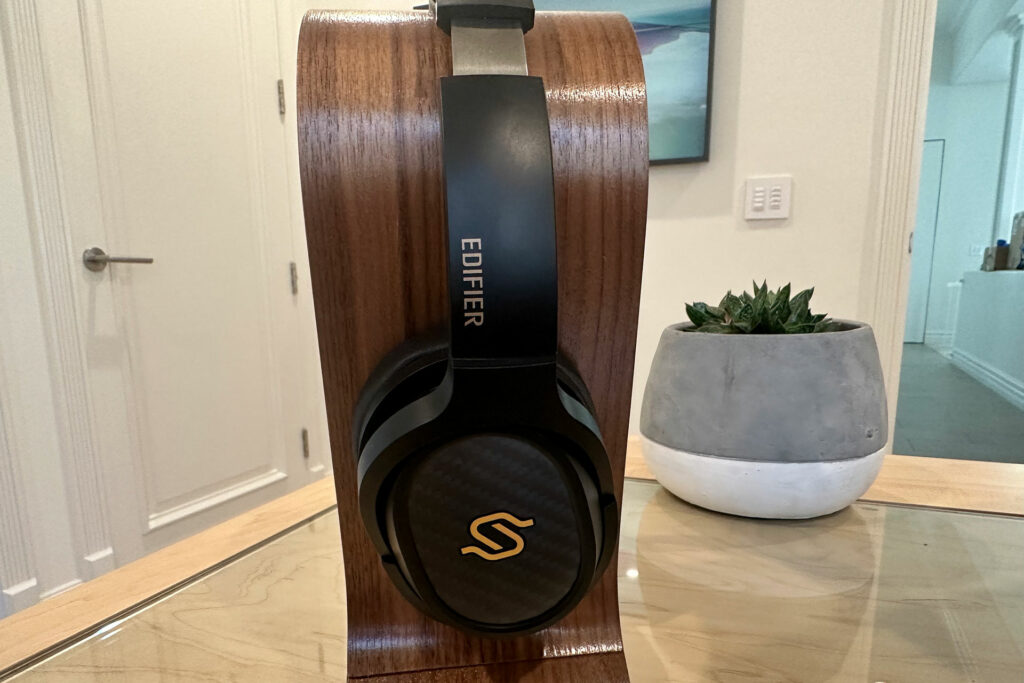 The STAX Edifier Spirit S3 headphones on a stand on Jerry Del Colliano's desk