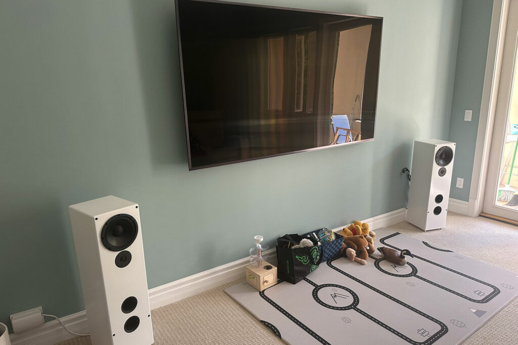Jerry Del Colliano's review pair of Tekton Design Lore Reference speakers with many toys for a two-year-old to round out the audiophile listening/play room