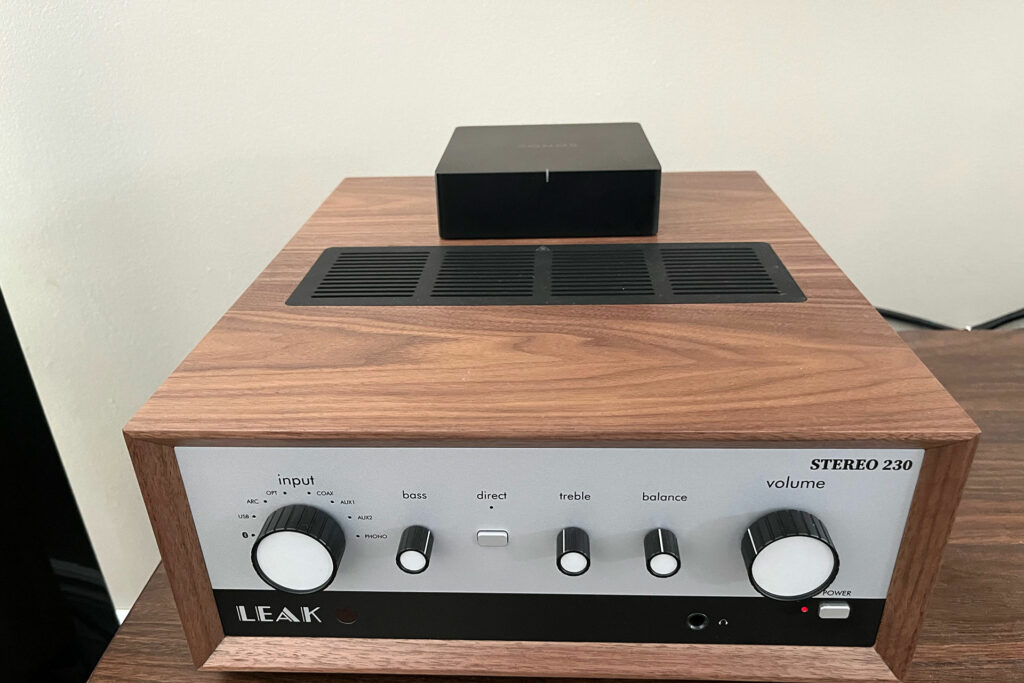 The small size of the Sonos Port is shown sitting on top of a Leak audiophile grade integrated amp