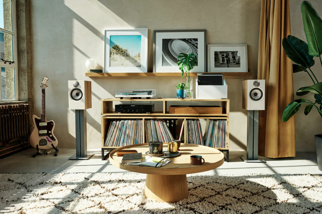 The Bowers & Wilkins 606 S3s installed in a slick, music-lovers room.