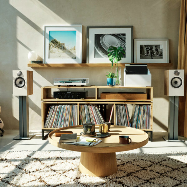 The Bowers & Wilkins 606 S3s installed in a slick, music-lovers room.