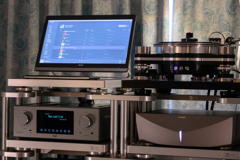 A modern audiophile system with both high end vinyl and digital front end source components in action.