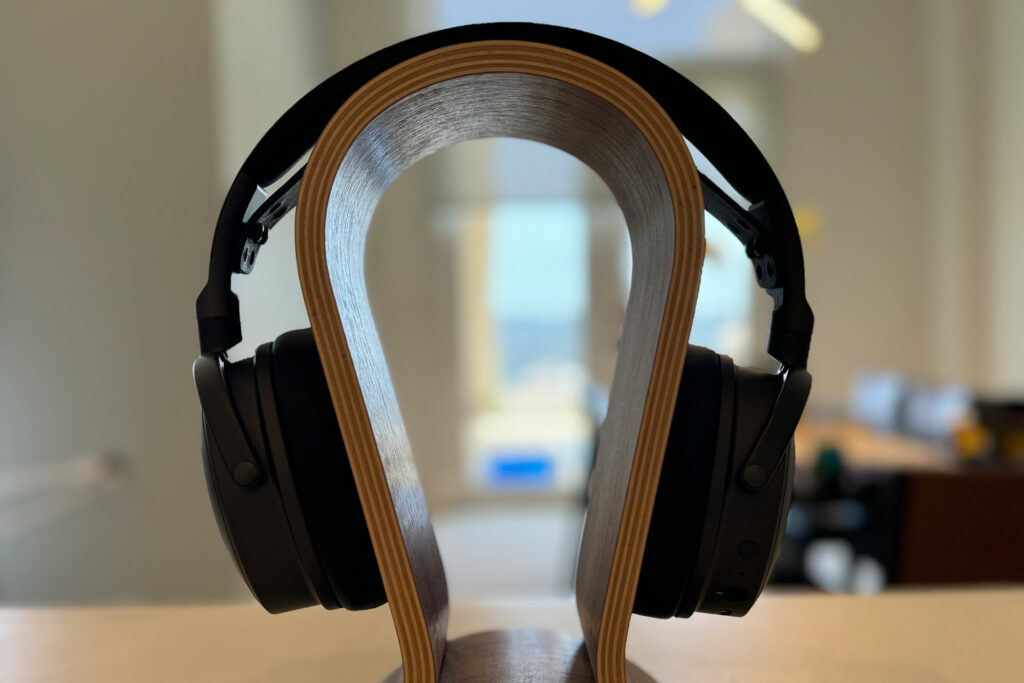 Our review sample of the Audeze Maxwell headphones on a stand