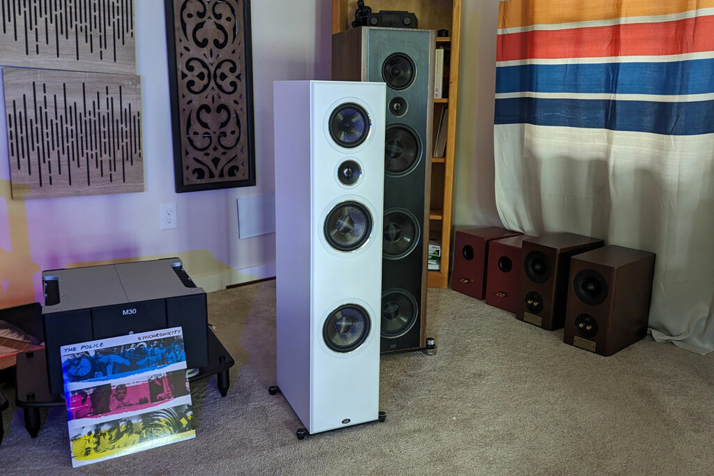 The PSB Imagine T65 speakers in white installed in Michael Zisserson's audiophile reference system.