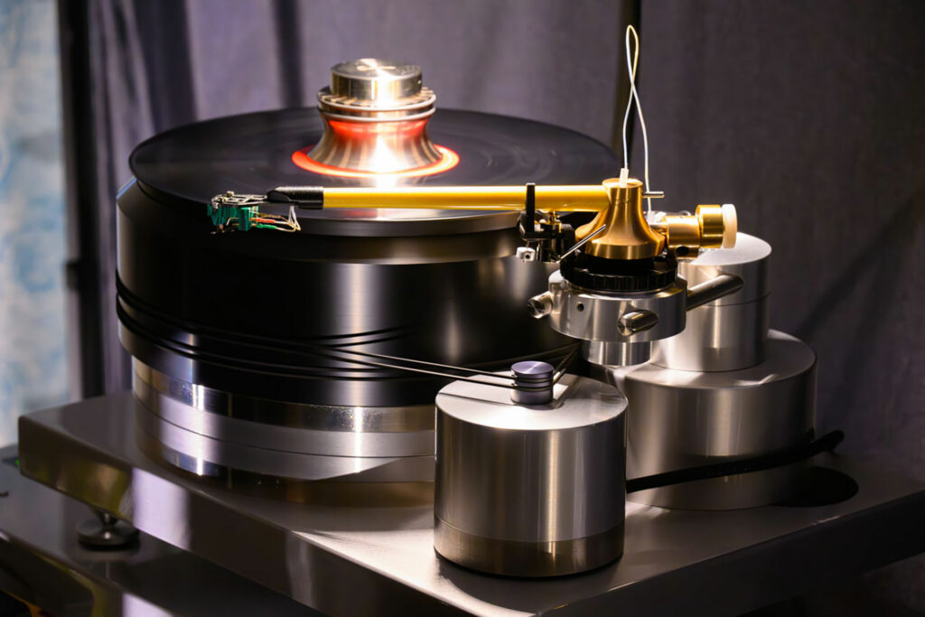 A very fancy audiophile turntable in a rock solid stand designed to keep the vibrations from your vinyl which is a very good thing. 