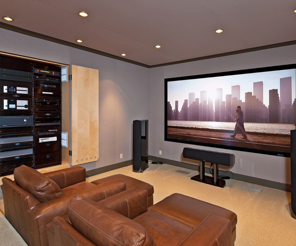 A home theater packing serious audiophile equipment as well as RPG room treatments behind the fabric wall.