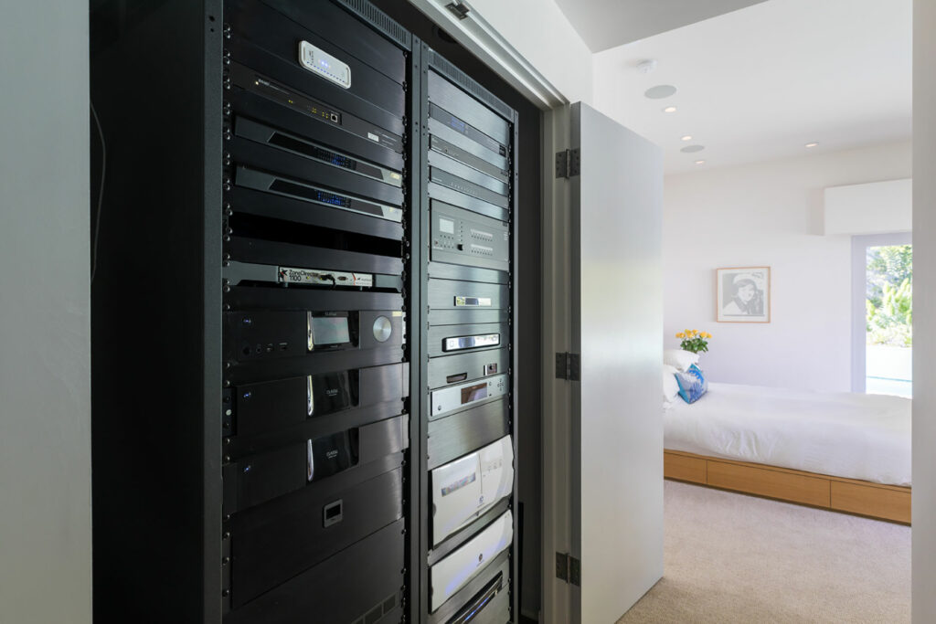 An impressive audiophile rack complete with Crestron, surround, whole-home Sonos audio and more.