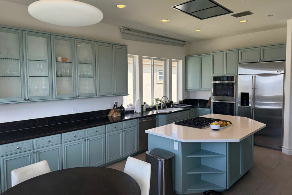 It is amazing to see what $6,000 and four days did to transform these kitchen cabinets.