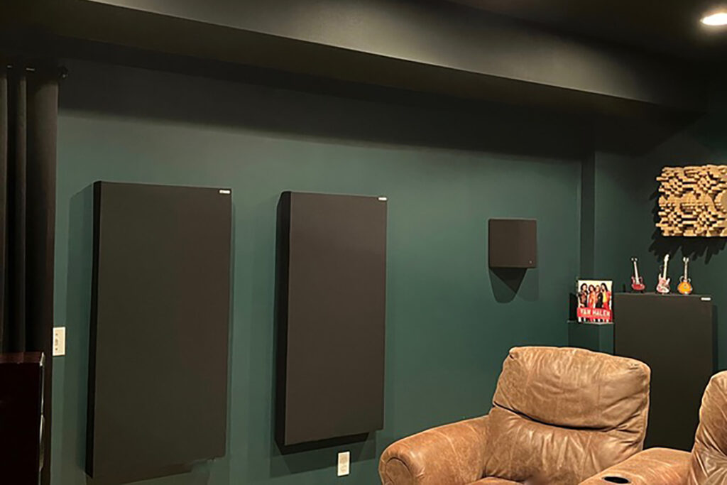 A closer look at Doug's GIK Acoustics room treatments hung nicely on the side walls of his reference AV system.