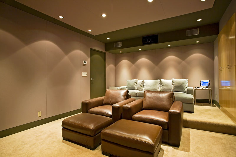 Fabric walls hide RPG bass, absorption and refraction treatments in Jerry Del Colliano's Brentwood audiophile grade screening room.