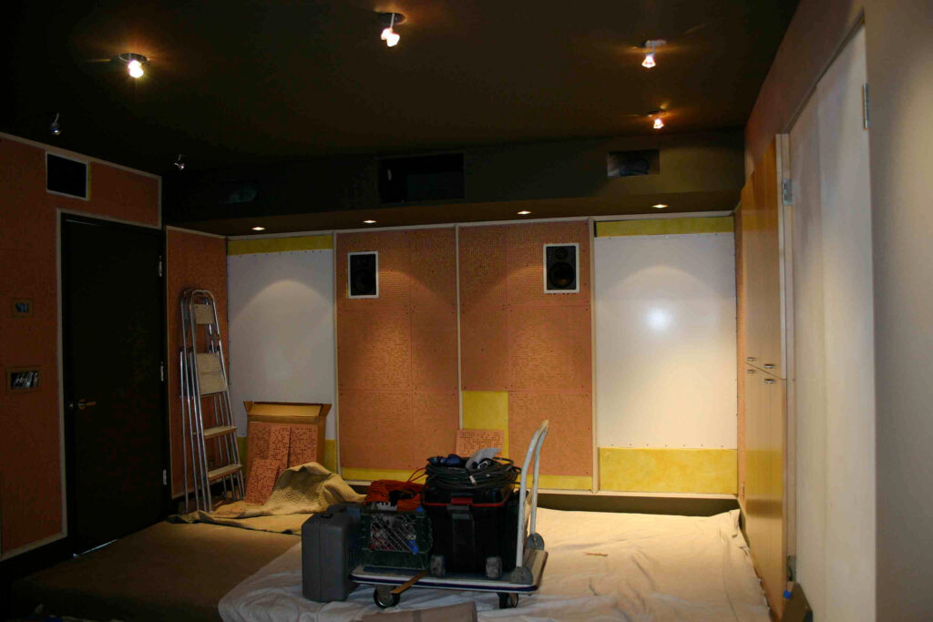 A "behind the fabric wall" look a how the highest end room treatments are installed in an audiophile listening room.