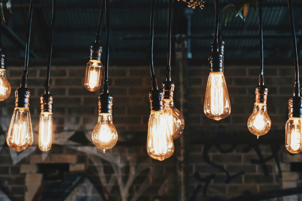 There are all sorts of cool and artsy lighting solutions that have little to no hum. AC noise is a massive performance killer in any audiophile system.