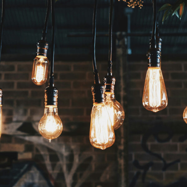 There are all sorts of cool and artsy lighting solutions that have little to no hum. AC noise is a massive performance killer in any audiophile system.
