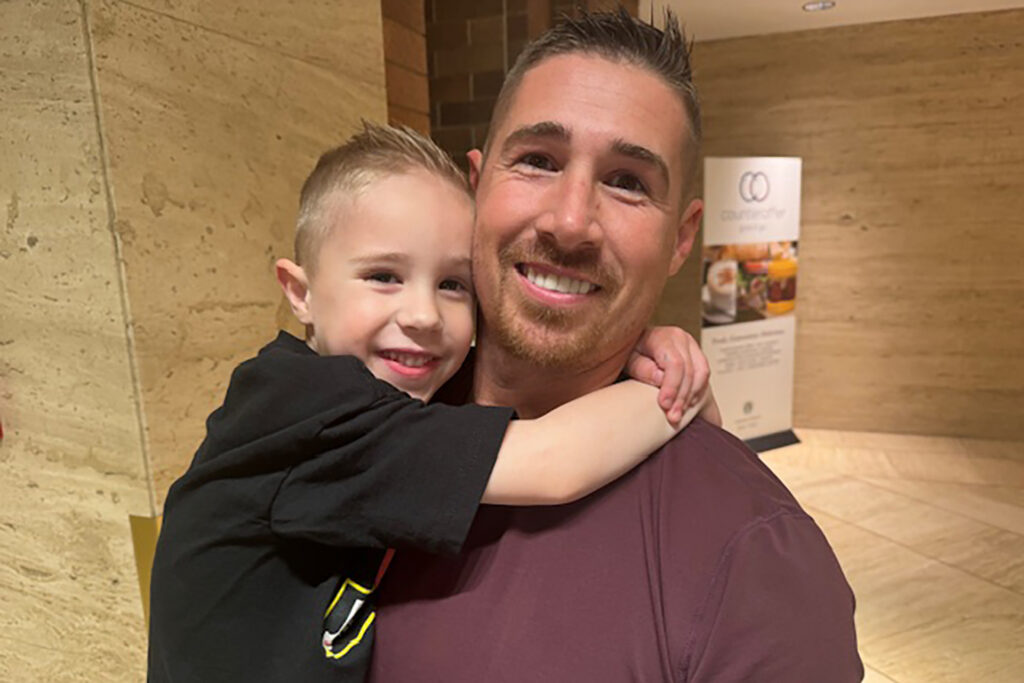Here's a young audiophile with an even younger one in tow from THE Show in Irvine. 