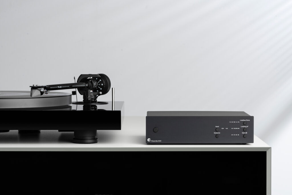 Pro-Ject Phono Box 3 phonostage with a matching Pro-Ject turntable installed nearby