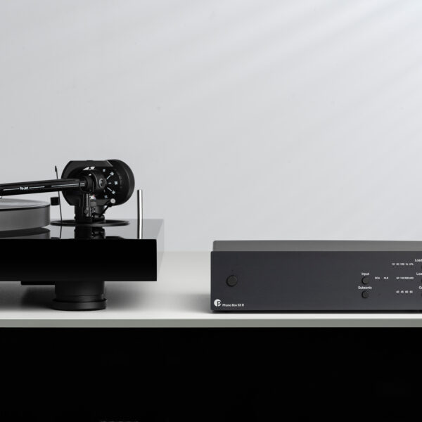 Pro-Ject Phono Box 3 phonostage with a matching Pro-Ject turntable installed nearby