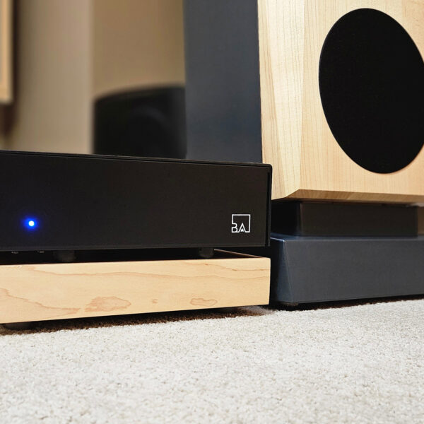 Buckeye's latest Hypex-based Class-D amp installed next to Mike Prager's Janszen speakers.