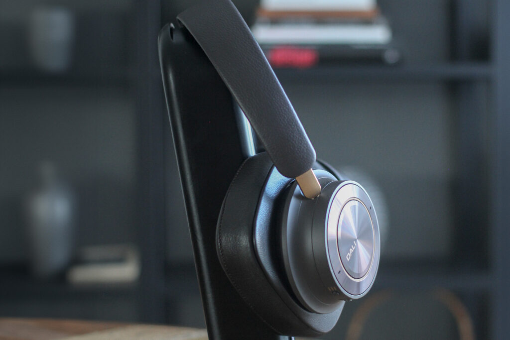 The Dali IO-12s on a stand while charging.