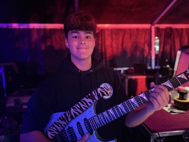 Vincenzo getting to play one of the guitars right before the show.