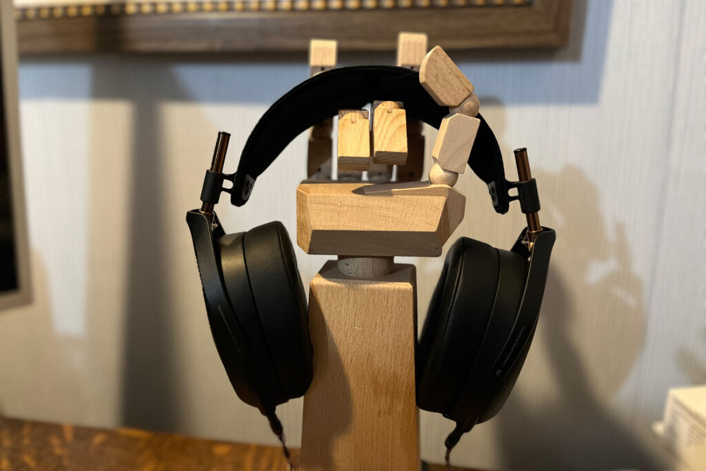 The Meze Liric wired headphones on a make-shift stand at Andrew Dewhirst's home.
