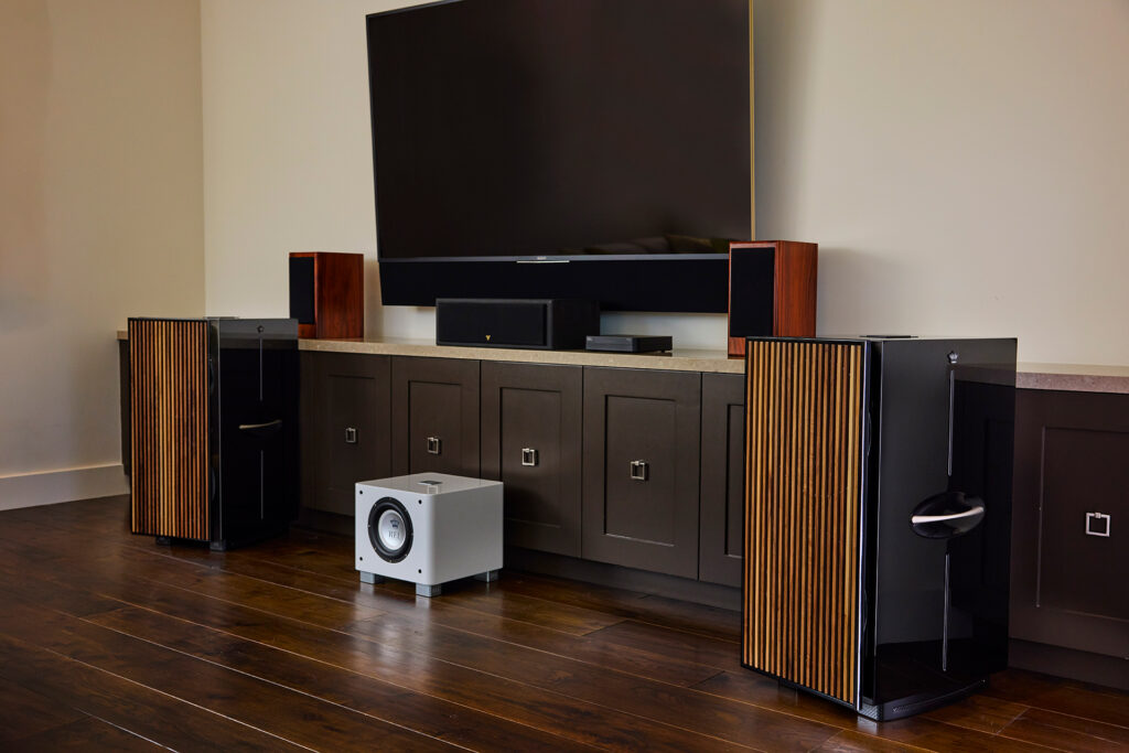 Check out the optional slat grills on the REL 212. They look great in person and are sonically transparent.