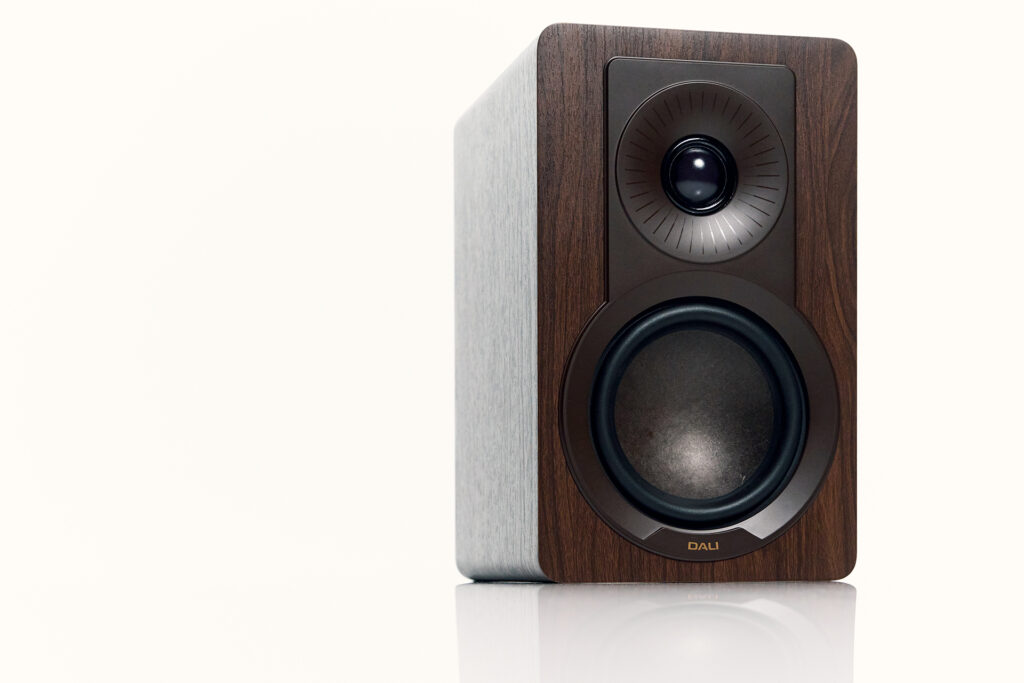 The DALI Cupid speakers in walnut.