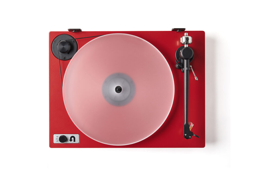 A top view of a lipstick red U-Turn Audio Orbit Special. 
