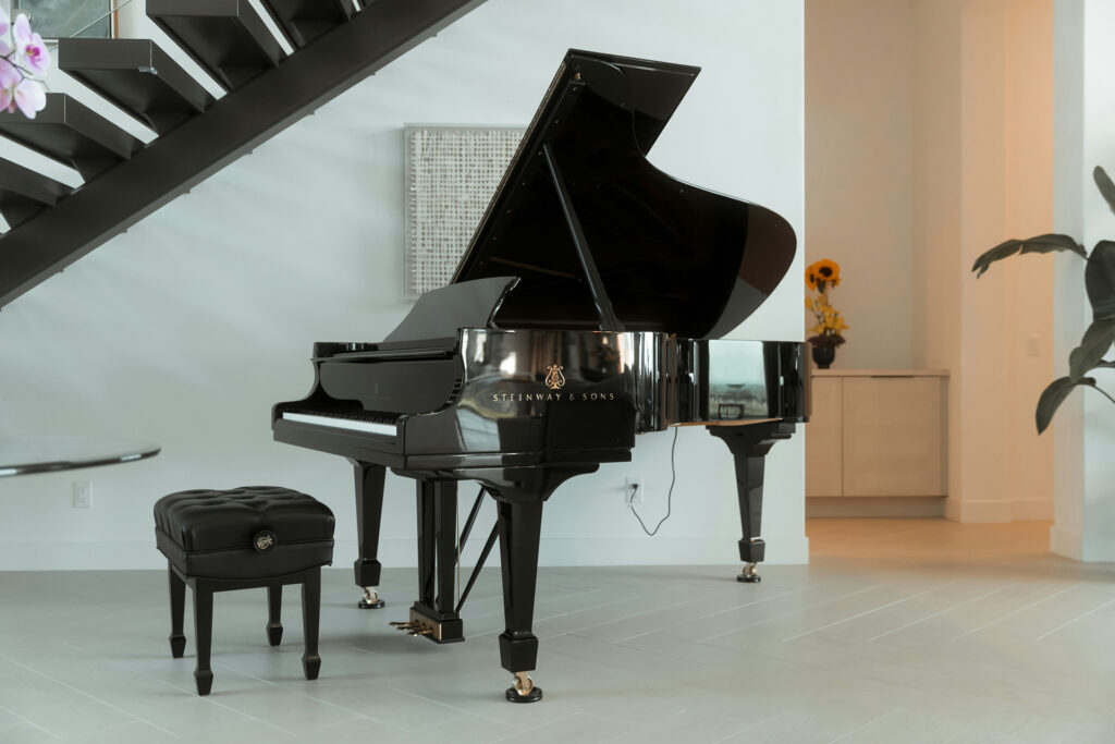 Often pianos are placed in rooms that might not be optimal for sonics but works for the overall interior design.