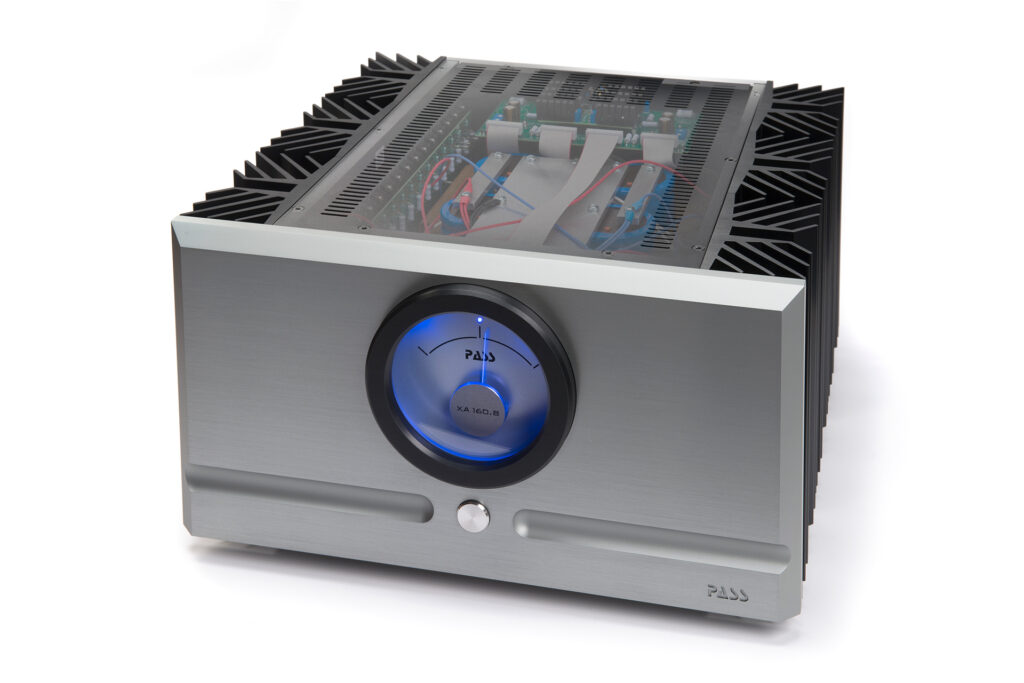 A single Pass Labs XA 160.8 mono amp with a glass top to see the design architecture inside.