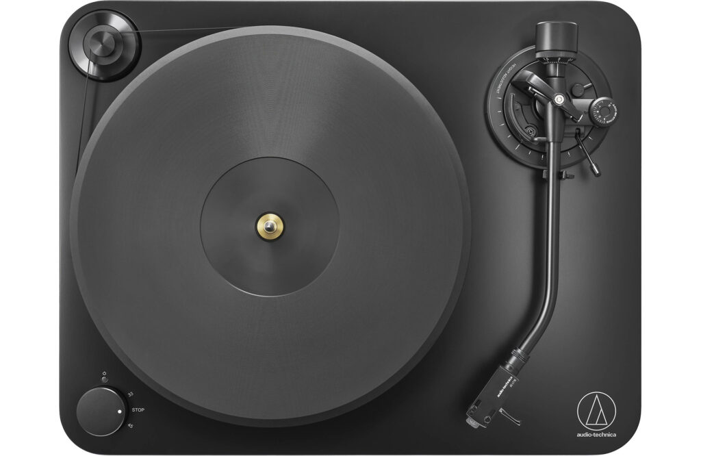 A top view of the A close-up of the tonearm of the Audio-Technica LP7X turntable.
