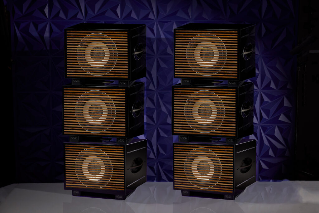 The REL S/550 Six Pack Line Array Sub Bass System with the more expensive wooden grills.