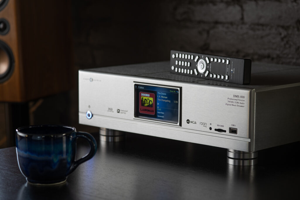 The Cary Audio DMS 800 DAC-Streamer installed and rocking some headphones.