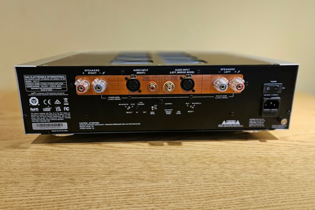 A look at the rear of the NAD M23 class D amp from behind at Mike Prager's home.
