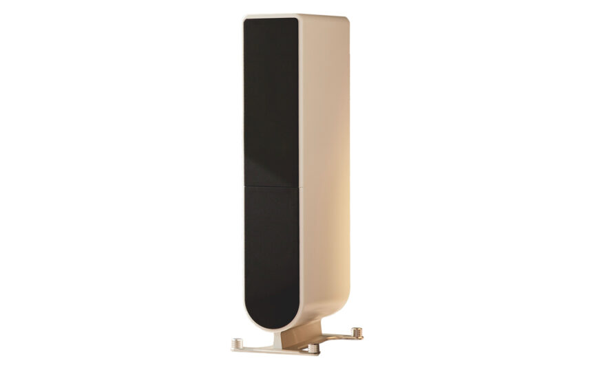 The PS Audio Aspen FR10 speakers in an ivory or off-white finish.