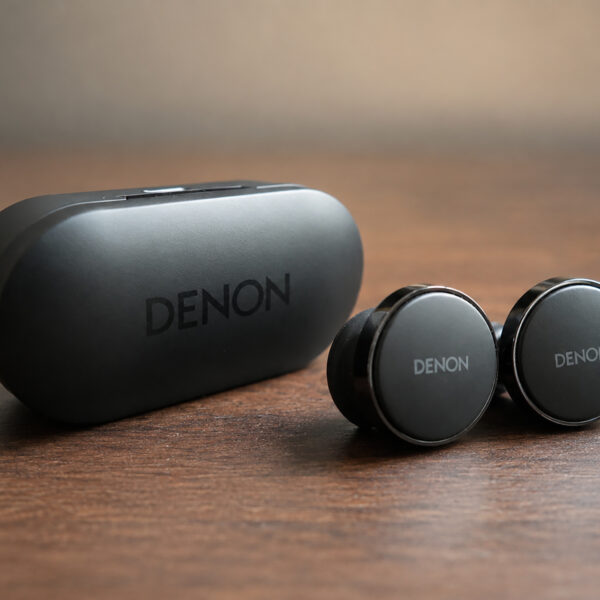The Denon PerL Pro Earbuds with their protective/charging case.