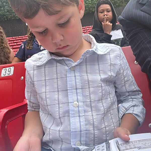 Young Giovanni reading the book Robot Sauce!
