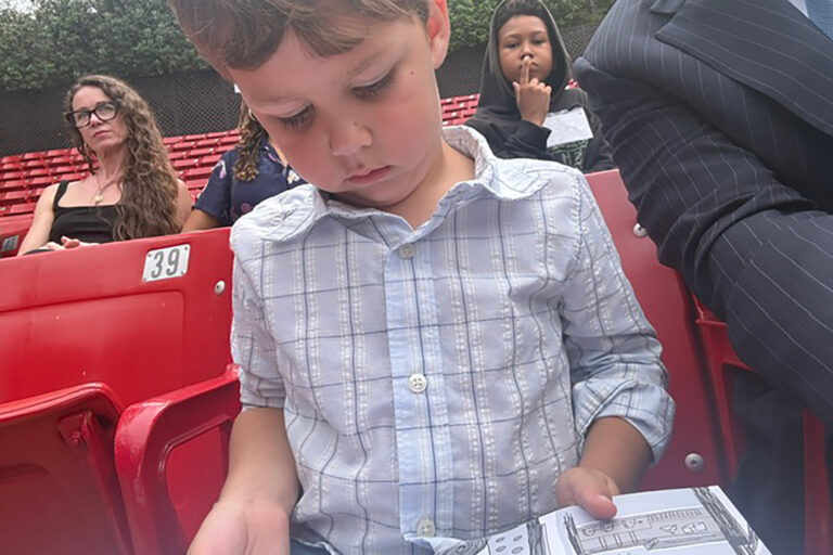Young Giovanni reading the book Robot Sauce!